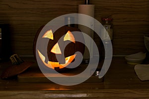 Freshly hollow pumpkin as jack-o-lantern glowing in the dark