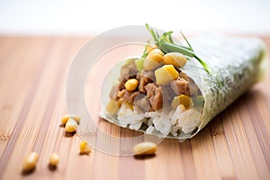 freshly made natto wrapped in a sushi roll