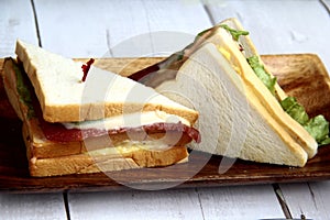 Freshly made sliced clubhouse sandwich on a plate