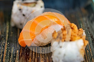 Freshly made sushi rolls on a plate landscape