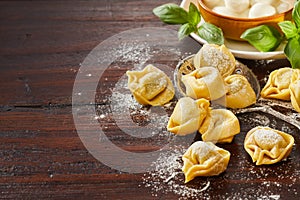 Freshly made uncooked Italian tortellini pasta