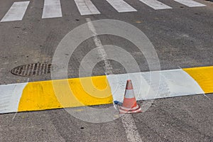 Freshly painted crosswalk and speed bump 2