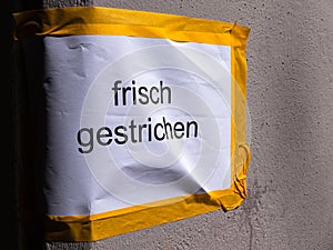 Freshly painted - german inscription photo