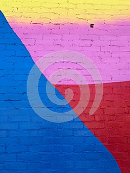 Freshly Painted Multi- Colored Brick Wall