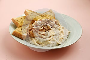 Freshly pasta with toasted garlic bread