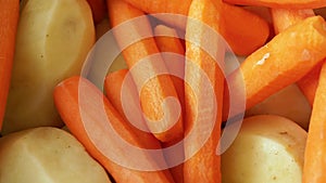 Freshly Peeled Potatoes and Carrots Close-Up view video