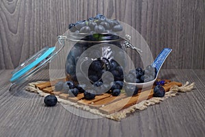 Freshly picked blueberries in a glass jar - Juicy and fresh blueberries - Blueberry antioxidant.