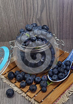 Freshly picked blueberries in a glass jar - Juicy and fresh blueberries - Blueberry antioxidant.