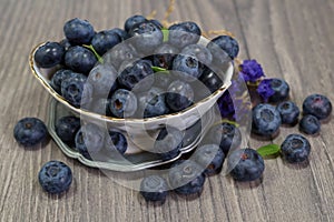 Freshly picked blueberries in a porcelain dish - Juicy and fresh blueberries - Blueberry antioxidant.