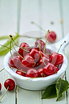 Freshly picked bowl of ripe red sweet cherries