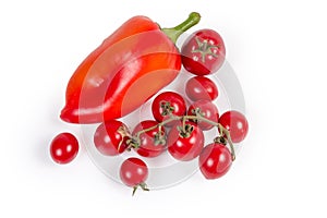 Freshly picked cherry tomatoes on branch and separately, bell pepper