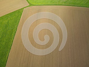 Freshly plowed agricultural land from above in autumn