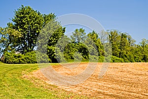 Freshly plowed field photo