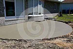 Freshly poured concrete outside patio