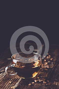 Freshly poured tea with brown tea sugar