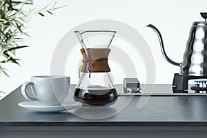 Freshly prepared black coffee in chemex pour over coffee maker near white coffee cup. 3d rendering