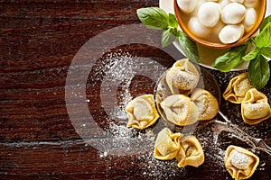 Freshly prepared uncooked handmade tortellini