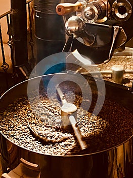 Freshly Roasted Aromatic Coffee Beans in a Coffee Roasting Machine.