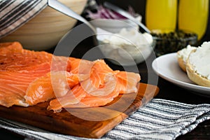 Freshly Sliced Lox on a Wooden Cutting Board