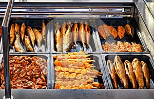 Freshly smoked fish for tourists and gourmets photo