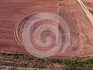 Freshly sowed cultivated spring field, aerial view