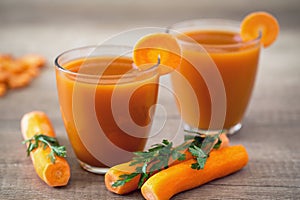 Freshly squeezed carrot juice in glasses