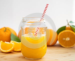 Freshly squeezed orange juice white background