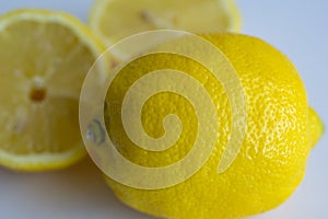 Freshly sun drenched lemons, on background Bokeh.