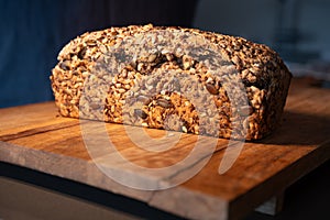 Freshly whole grain bread on wood surface