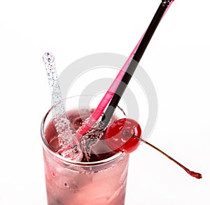 Freshness cocktail with ice in glass with drinking straw