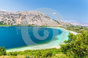 Freshwater lake in village Kavros in Crete island, Greece. Magical turquoise waters, lagoons.