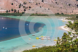 Freshwater lake in village Kavros in Crete island, Greece. Magical turquoise waters, lagoons.