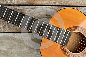 Fretboard of acoustic guitar.