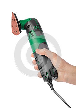 Fretsaw power tool with grinding attachment in hand