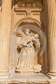Friar with child sculpture in Penaranda de Duero