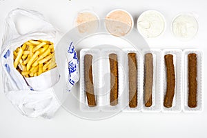 Fricandel with french fries and sauces