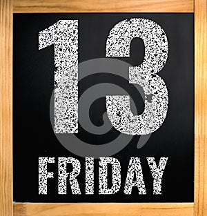 Friday 13, white chalk text on black board