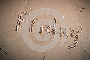 Friday written on beach sand-2.CR2