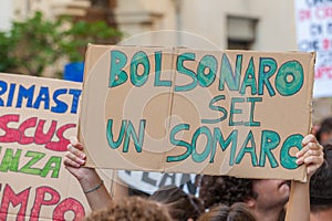 Fridays for future: students hands showing  banners and boards