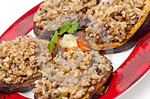 Fried aggplant toppet with a mix of mince and rice