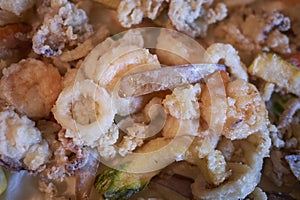 Fried assorted seafood close up