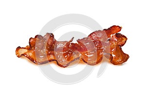 Fried bacon rashers isolated on white background