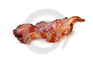 Fried bacon rashers isolated on white background