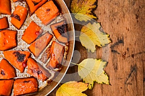 Fried baked on grill pumpkin, a traditional autumn snack.Warm dish as a dessert.