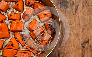 Fried baked on grill pumpkin, a traditional autumn snack.Warm dish as a dessert.