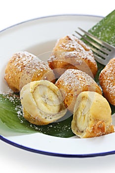 Fried banana fritters , pisang goreng photo