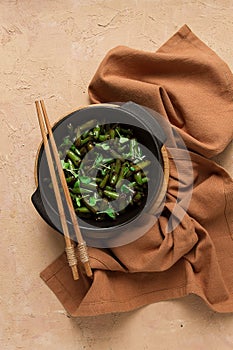 fried bean pods, in soy sauce, with sesame seeds, homemade, no people,