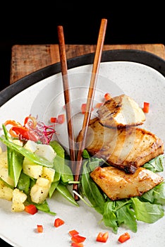 Fried black cod fish with soy sauce and potato