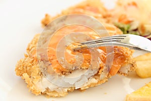Fried breaded fish steak