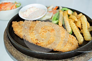 Fried breaded fish steak